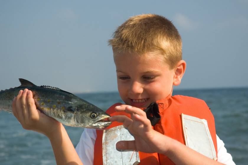 kid with spanish mackerel